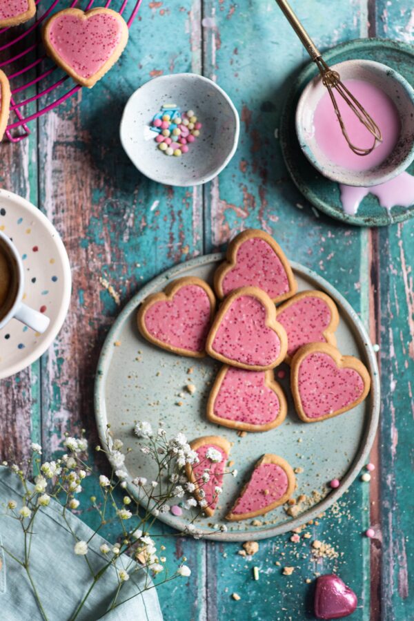 pink heart cakes for a background of turquoise boards